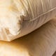 Pourquoi Les Oreillers Jaunissent Et Comment Les Nettoyer 1 Image for article titled Why Pillows Turn Yellow, and How to Clean Them